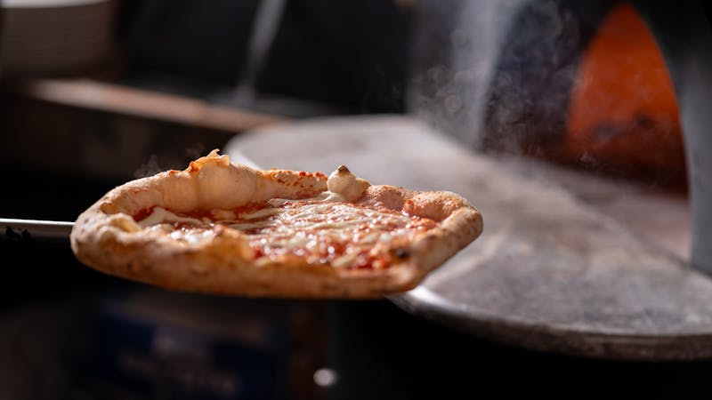 Four cheese pizza with golden melted cheese