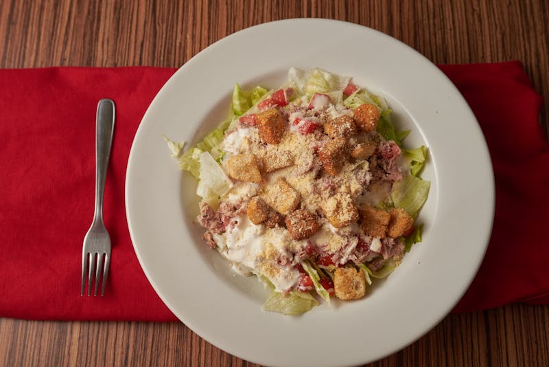 Classic Caesar salad with croutons and parmesan