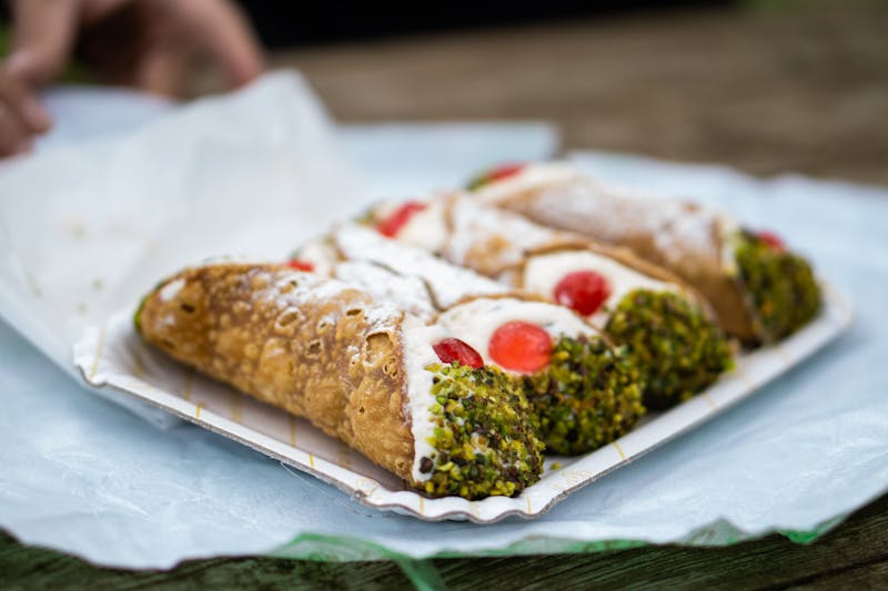 Sicilian cannoli filled with sweet ricotta cream